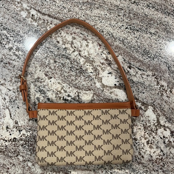 Michael Kors Handbags - BNWOT Michael kors mini purse/belt bag